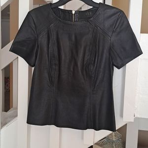 CLE Gorgeous Black Lamb Leather short sleeve top zips  in back. Excellent sz XS